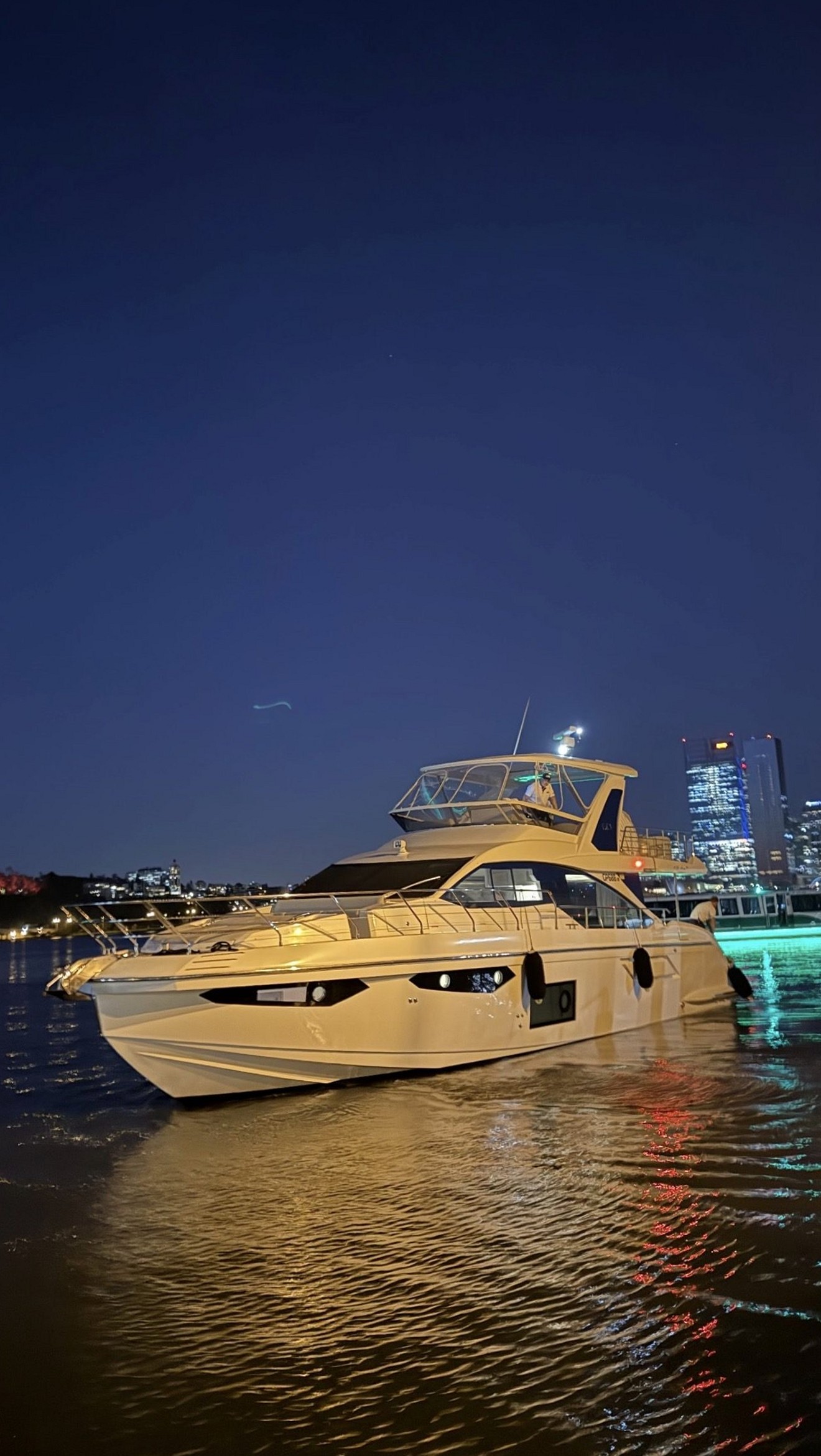 Yacht against the Perth skyline